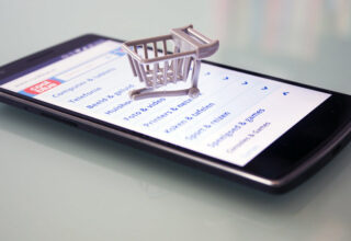 Small business owner reviewing product categories for an online shop